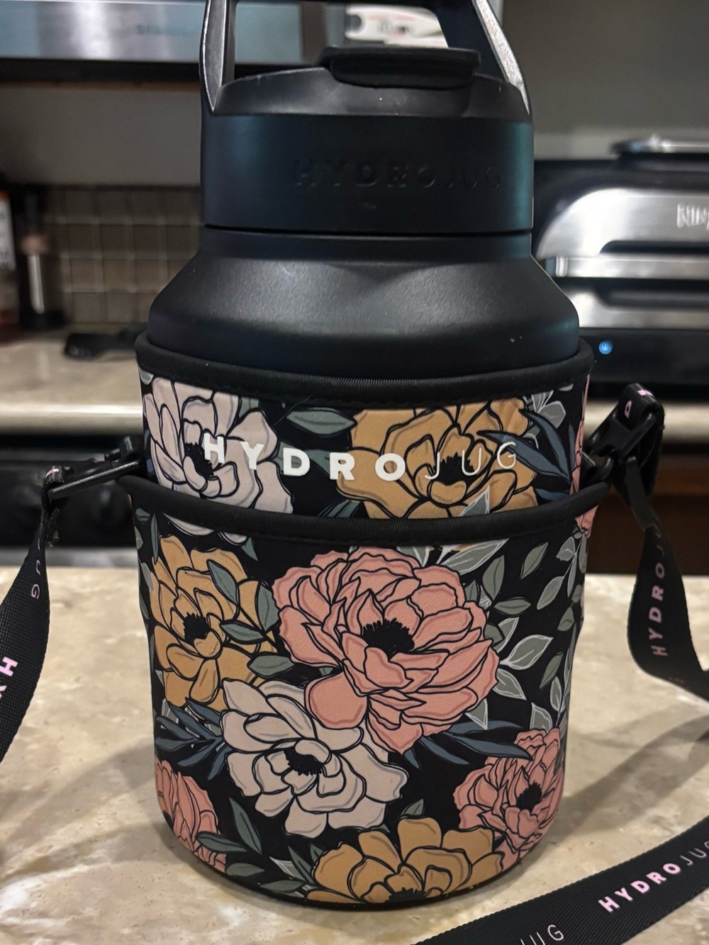 HydroJug Floral Neoprene Bottle Carrier in Black with Pink & Mustard Flowers